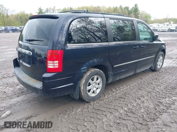 2010 Chrysler Town & Country Touring with VIN 2A4RR5D15AR170014, listed as a IAAI auction lot 42202810 with 199,557 mi miles and . Bid and sale history available at DreamBid. Image 4.