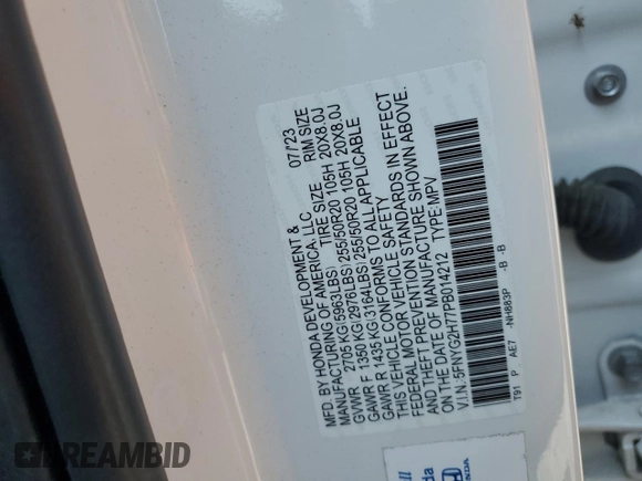 2023 Honda Pilot Touring with VIN 5FNYG2H77PB014212, listed as a Copart auction lot 59222715 with 4,507 mi miles and Salvage title. Bid and sale history available at DreamBid. Image 13.