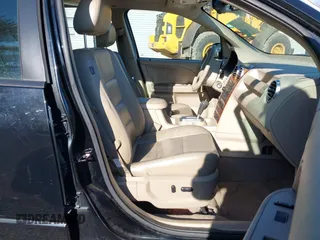 2005 Ford Freestyle Limited with VIN 1FMDK06115GA37063, listed as a IAAI auction lot 41698683 with 173,712 mi miles. Bid and sale history available at carsss.com. Image 5.