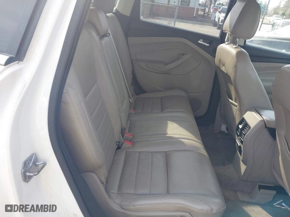 2014 Ford Escape Titanium with VIN 1FMCU9JXXEUC18993, listed as a IAAI auction lot 41802872 with 124,995 mi miles. Bid and sale history available at carsss.com. Image 8.