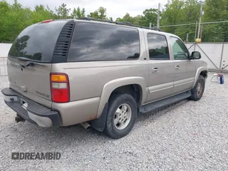 2003 Chevrolet Suburban LT z VIN 1GNEC16Z13J140136, wystawiony jako IAAI lot #42142827 z przebiegiem 252 698 mil mil oraz . Historia ofert i sprzedaży dostępna na DreamBid. Obrazek 4.