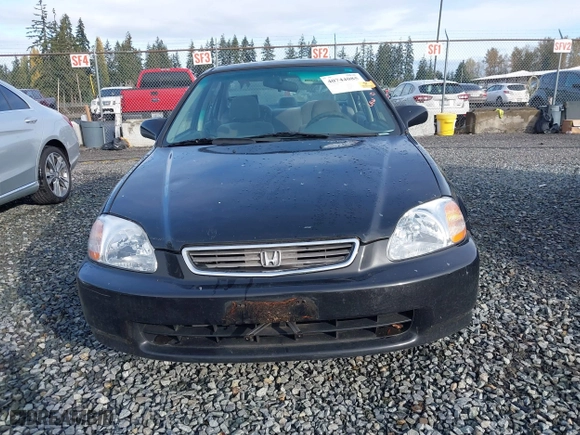 1997 Honda Civic EX with VIN 2HGEJ8542VH520783, listed as a IAAI auction lot 40744085 with 155,772 mi miles. Bid and sale history available at carsss.com. Image 12.