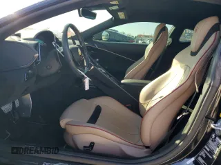 2022 Ferrari Roma z VIN ZFF98RNA5N0269013, wystawiony jako Copart lot #44682265 z przebiegiem 4360 mil mil oraz Nie do naprawy. Historia ofert i sprzedaży dostępna na DreamBid. Obrazek 7.