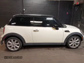 2010 MINI Hardtop S with VIN WMWMF7C5XATX41382, listed as a IAAI auction lot 40558359 with 96,158 mi miles and . Bid and sale history available at DreamBid. Image 13.