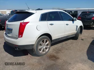2014 Cadillac SRX Performance Collection with VIN 3GYFNCE36ES527809, listed as a IAAI auction lot 41790776 with 166,302 mi miles. Bid and sale history available at carsss.com. Image 4.