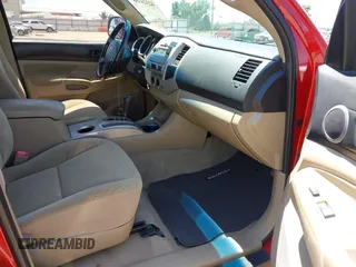 2010 Toyota Tacoma PreRunner with VIN 3TMJU4GN3AM105454, listed as a IAAI auction lot 42321358 with 113,714 mi miles and . Bid and sale history available at DreamBid. Image 5.