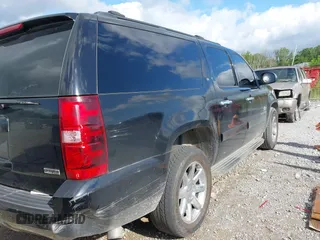 2011 Chevrolet Suburban LT z VIN 1GNSCJE0XBR133465, wystawiony jako IAAI lot #42294755 z przebiegiem 328 824 mil mil oraz . Historia ofert i sprzedaży dostępna na DreamBid. Obrazek 4.