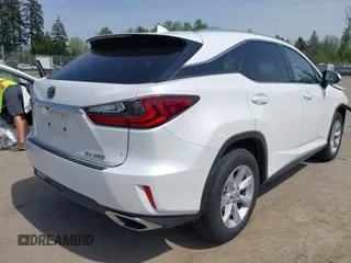 2017 Lexus RX with VIN 2T2BZMCA7HC118019, listed as a IAAI auction lot 42128499 with 100,448 mi miles. Bid and sale history available at carsss.com. Image 4.
