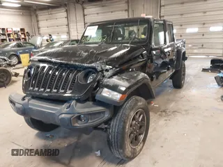 2021 Jeep Gladiator Willys with VIN 1C6HJTAGXML514043, listed as a IAAI auction lot 41869052 with 37,783 mi miles. Bid and sale history available at carsss.com. Image 2.