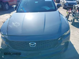 2024 Mazda CX-50 S Select with VIN 7MMVABAMXRN238079, listed as a IAAI auction lot 41563281 with 5,576 mi miles and . Bid and sale history available at DreamBid. Image 13.
