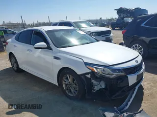 2019 Kia Optima LX with VIN 5XXGT4L34KG323763, listed as a IAAI auction lot 42520807 with 117,323 mi miles and . Bid and sale history available at DreamBid. Image 1.