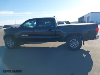 2019 Toyota Tacoma 4WD SR5 with VIN 3TMDZ5BN1KM060088, listed as a IAAI auction lot 41804525 with 69,893 mi miles. Bid and sale history available at carsss.com. Image 14.