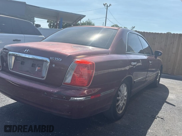 2005 Hyundai XG z VIN KMHFU45E95A381631, wystawiony jako Copart lot #57705005 z przebiegiem 202 730 mil mil oraz Tytuł czysty. Historia ofert i sprzedaży dostępna na DreamBid. Obrazek 4.