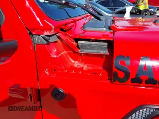 2022 Jeep Gladiator Willys Sport z VIN 1C6HJTAG0NL180848, wystawiony jako IAAI lot #41778129 z przebiegiem Nie podano mil oraz . Historia ofert i sprzedaży dostępna na DreamBid. Obrazek 20.