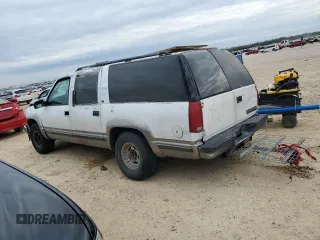1999 Chevrolet Suburban with VIN 1GNEC16R7XJ418169, listed as a Copart auction lot 88995495 with 2,015,240 mi miles and Salvage title. Bid and sale history available at DreamBid. Image 2.