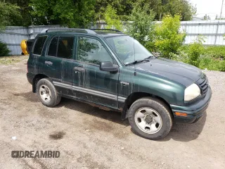 2003 Suzuki Vitara JLX z VIN 2S3TD52V136101732, wystawiony jako Copart lot #58477845 z przebiegiem 105 628 mil mil oraz Czysty tytuł • Clean title. Historia ofert i sprzedaży dostępna na DreamBid. Obrazek 4.