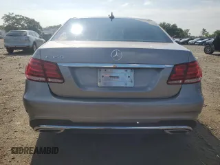 2014 Mercedes-Benz E 350 Sport with VIN WDDHF5KB9EA862458, listed as a Copart auction lot 63375545 with 75,110 mi miles and Salvage title. Bid and sale history available at DreamBid. Image 6.