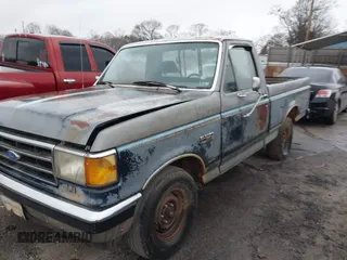 1990 Ford F-150 "S" with VIN 1FTDF15Y4LNB46798, listed as a IAAI auction lot 41767651 with 578,470 mi miles. Bid and sale history available at carsss.com. Image 6.