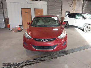 2012 Hyundai Elantra GLS with VIN KMHDH4AE2CU304144, listed as a IAAI auction lot 41215924 with 151,823 mi miles. Bid and sale history available at carsss.com. Image 12.