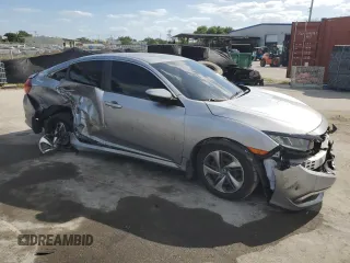2019 Honda Civic LX with VIN 2HGFC2F69KH567767, listed as a Copart auction lot 52069575 with 102,259 mi miles and Non Repairable. Bid and sale history available at DreamBid. Image 4.