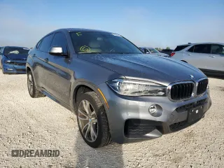 2015 BMW X6 xDrive35i with VIN 5UXKU2C58F0F96503, listed as a Copart auction lot 70099462 with 77,940 mi miles. Bid and sale history available at carsss.com. Image 4.