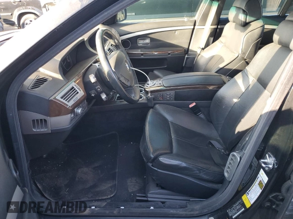 2007 BMW 7 Series 750i with VIN WBAHL83507DT07958, listed as a Copart auction lot 73318944 with 127,698 mi miles and Salvage Title. Bid and sale history available at DreamBid. Image 7.