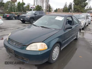 1997 Honda Civic DX with VIN 1HGEJ6128VL023684, listed as a IAAI auction lot 41502999 with 140,871 mi miles. Bid and sale history available at carsss.com. Image 6.
