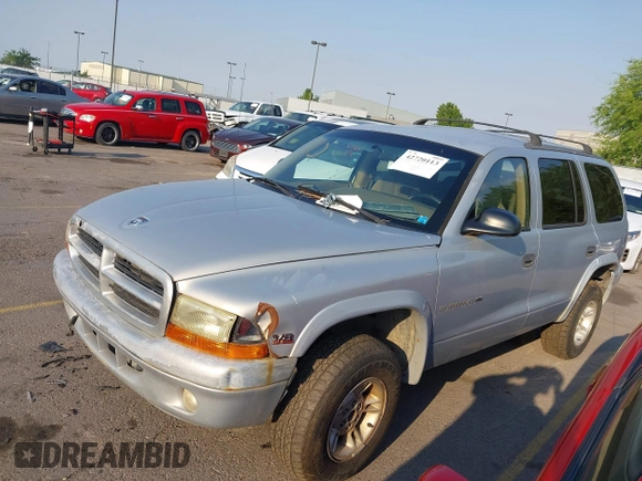 1999 Dodge Durango with VIN 1B4HS28Y1XF573917, listed as a IAAI auction lot 42720113 with 240,033 mi miles and . Bid and sale history available at DreamBid. Image 2.