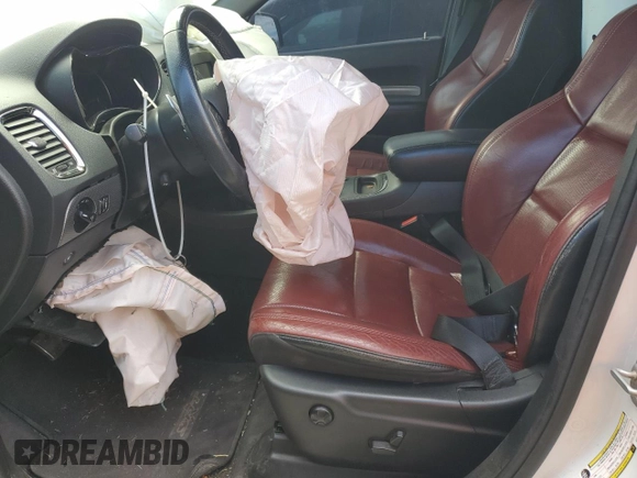 2018 Dodge Durango SRT with VIN 1C4SDJGJ4JC150324, listed as a Copart auction lot 63388975 with 126,622 mi miles and Salvage title. Bid and sale history available at DreamBid. Image 7.