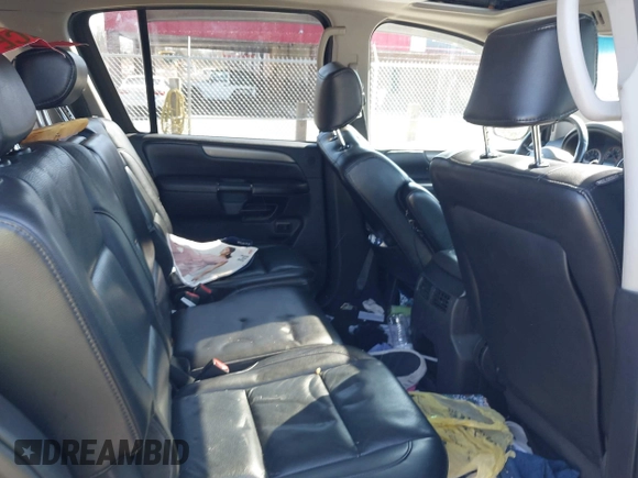 2009 Nissan Armada SE z VIN 5N1BA08D89N601178, wystawiony jako IAAI lot #41854346 z przebiegiem 228 637 mil mil oraz . Historia ofert i sprzedaży dostępna na DreamBid. Obrazek 8.