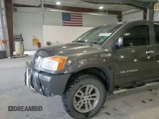 2012 Nissan Titan SL with VIN 1N6BA0ECXCN300562, listed as a Copart auction lot 58244125 with 131,595 mi miles and Salvage title. Bid and sale history available at DreamBid. Image 14.