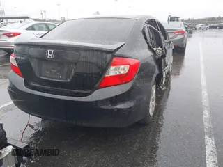 2012 Honda Civic LX with VIN 2HGFB2F5XCH605230, listed as a IAAI auction lot 41999663 with 221,815 mi miles and . Bid and sale history available at DreamBid. Image 4.