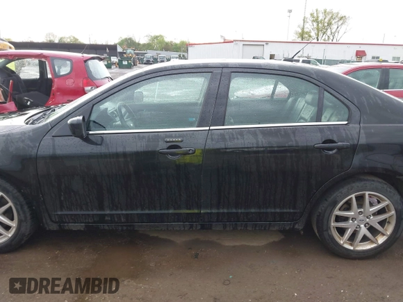 2011 Ford Fusion SEL with VIN 3FAHP0JA2BR209979, listed as a IAAI auction lot 42143065 with 185,192 mi miles and . Bid and sale history available at carsss.com. Image 14.