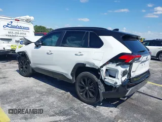 2024 Toyota RAV4 Hybrid XSE with VIN 2T3E6RFV9RW077941, listed as a IAAI auction lot 42012134 with 31,009 mi miles and . Bid and sale history available at DreamBid. Image 3.