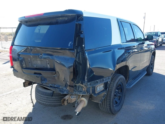 2020 Chevrolet Tahoe Commercial with VIN 1GNLCDEC4LR183215, listed as a IAAI auction lot 40783993 with 119,705 mi miles. Bid and sale history available at carsss.com. Image 4.