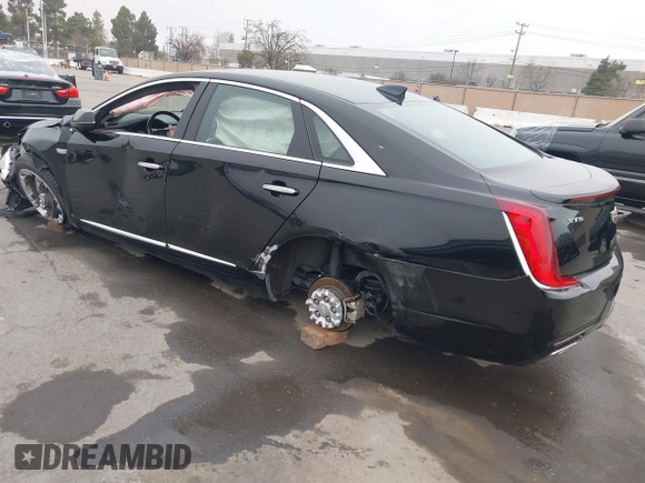 2018 Cadillac XTS Luxury with VIN 2G61M5S33J9119684, listed as a IAAI auction lot 41659807 with 107,156 mi miles and . Bid and sale history available at DreamBid. Image 3.