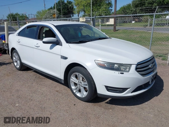 2015 Ford Taurus SEL z VIN 1FAHP2E8XFG196270, wystawiony jako IAAI lot #42007068 z przebiegiem 150 093 mil mil oraz . Historia ofert i sprzedaży dostępna na DreamBid. Obrazek 1.