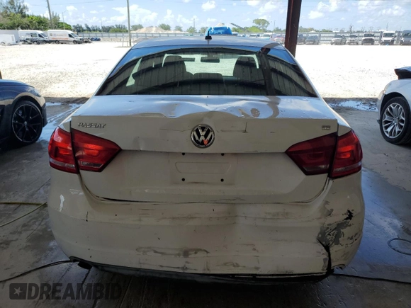 2012 Volkswagen Passat S с VIN 1VWAH7A36CC036998, выставлен на аукционе Copart как лот 60655295 с пробегом 150 557 миль миль и Списание • Salvage title. История ставок и продаж доступна на DreamBid. Изображение 6.