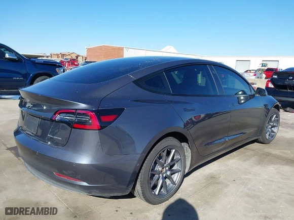 2022 Tesla Model 3 Long Range with VIN 5YJ3E1EB9NF197127, listed as a IAAI auction lot 41366323 with 56,559 mi miles. Bid and sale history available at carsss.com. Image 4.