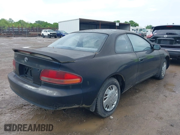 1995 Toyota Celica ST with VIN JT2AT00F7S0040443, listed as a IAAI auction lot 42125327 with 286,767 mi miles. Bid and sale history available at carsss.com. Image 4.