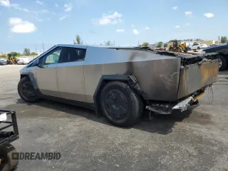 2024 Tesla Cybertruck с VIN 7G2CEHED3RA051591, выставлен на аукционе Copart как лот 56845395 с пробегом Не указан миль и На запчасти • Non repairable. История ставок и продаж доступна на DreamBid. Изображение 2.