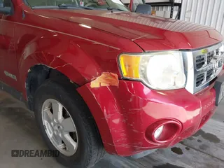 2008 Ford Escape XLT with VIN 1FMCU03198KE82341, listed as a IAAI auction lot 42573165 with 133,620 mi miles and . Bid and sale history available at DreamBid. Image 6.