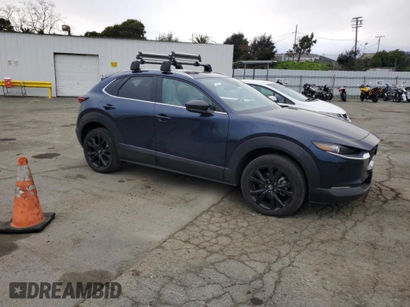 2022 Mazda CX-30 Premium with VIN 3MVDMBDY1NM446064, listed as a Copart auction lot 46527505 with 20,742 mi miles and Salvage Title. Bid and sale history available at DreamBid. Image 4.