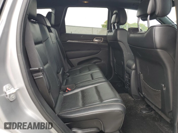 2015 Jeep Grand Cherokee Overland with VIN 1C4RJECG4FC808241, listed as a Copart auction lot 59699685 with 67,542 mi miles and Salvage title. Bid and sale history available at DreamBid. Image 11.