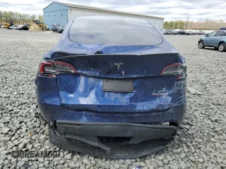2024 Tesla Model Y Performance z VIN 7SAYGDEF6RA268195, wystawiony jako Copart lot #53211075 z przebiegiem Nie podano mil oraz Szkoda całkowita • Salvage title. Historia ofert i sprzedaży dostępna na DreamBid. Obrazek 6.