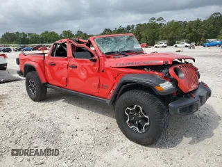 2020 Jeep Gladiator Rubicon z VIN 1C6JJTBG4LL167159, wystawiony jako Copart lot #54992395 z przebiegiem 73 906 mil mil oraz Szkoda całkowita • Salvage title. Historia ofert i sprzedaży dostępna na DreamBid. Obrazek 4.
