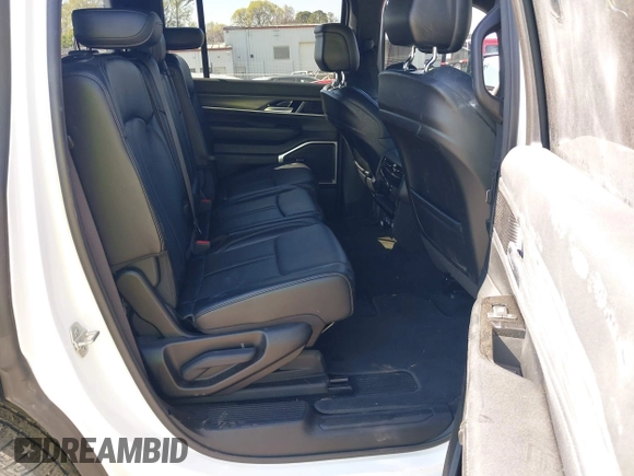 2024 Jeep Wagoneer Series III with VIN 1C4SJVDP9RS104904, listed as a IAAI auction lot 41912274 with 46,799 mi miles and . Bid and sale history available at DreamBid. Image 8.