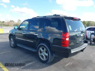 2012 Chevrolet Tahoe LTZ with VIN 1GNSKCE04CR218348, listed as a IAAI auction lot 41541342 with 96,365 mi miles and . Bid and sale history available at DreamBid. Image 3.
