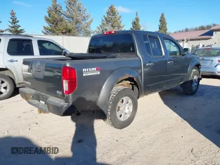 2006 Nissan Frontier SE with VIN 1N6AD07W26C402027, listed as a IAAI auction lot 41249886 with 155,417 mi miles and . Bid and sale history available at DreamBid. Image 4.