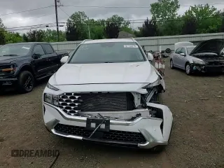 2022 Hyundai Santa Fe SEL z VIN 5NMS6DAJ0NH428003, wystawiony jako Copart lot #57133475 z przebiegiem 23 015 mil mil oraz Szkoda całkowita • Salvage title. Historia ofert i sprzedaży dostępna na DreamBid. Obrazek 13.
